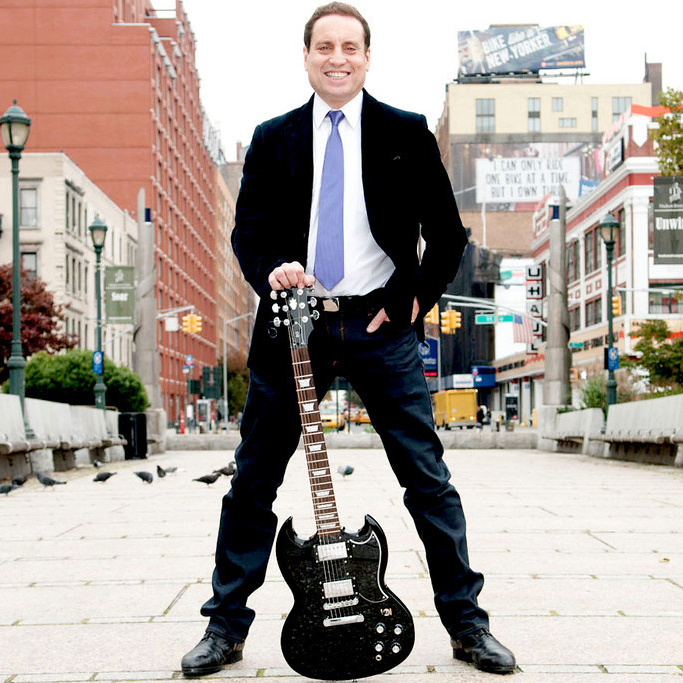 Image of Dr.Jeff with a Guitar in NYC